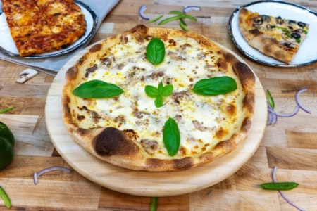 White Chicken Pizza with creamy sauce served at Pali Pali Pizza in Palatine, IL